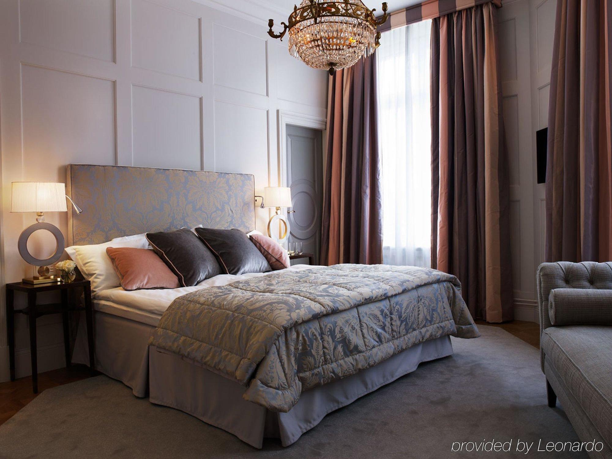 Grand Hotel Stoccolma Camera foto A bedroom at the hotel